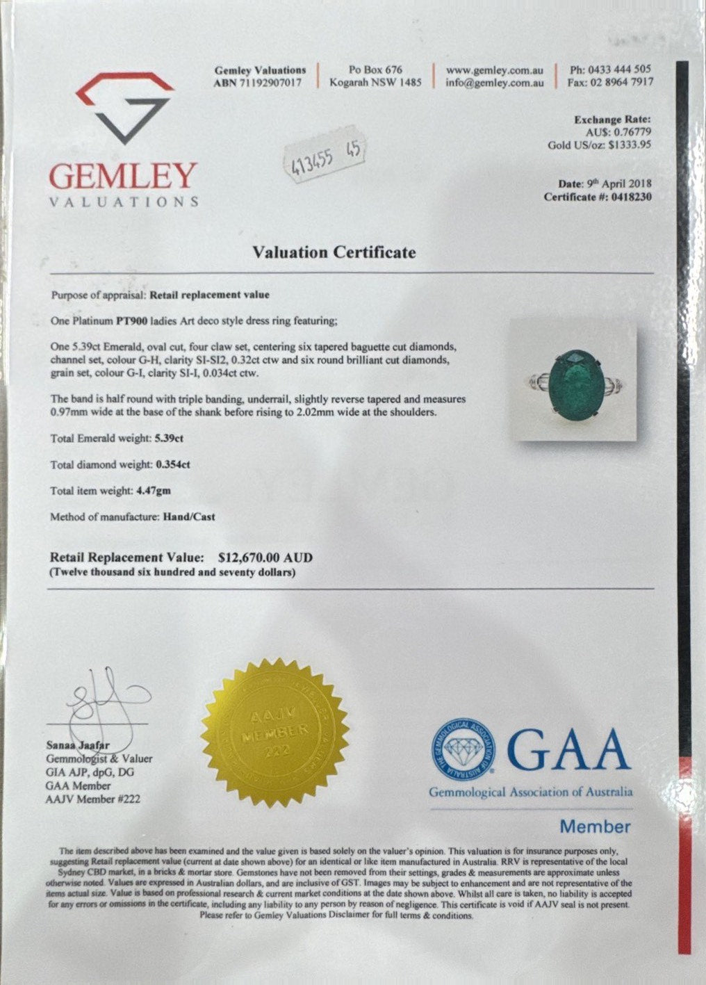 Platinum Emerald and Diamond Art Deco design ring