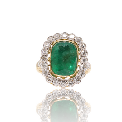 18ct yellow gold emerald and diamond halo ring