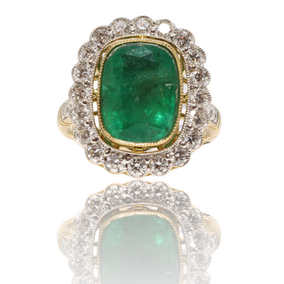 18ct yellow gold emerald and diamond halo ring