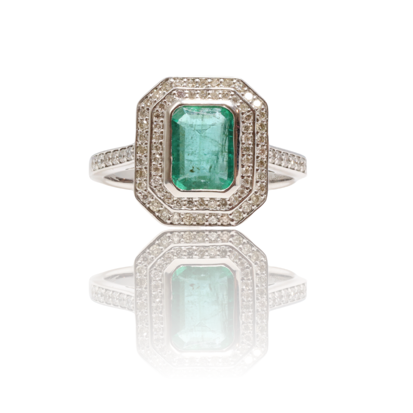 18CT White Gold Emerald and Diamond ring