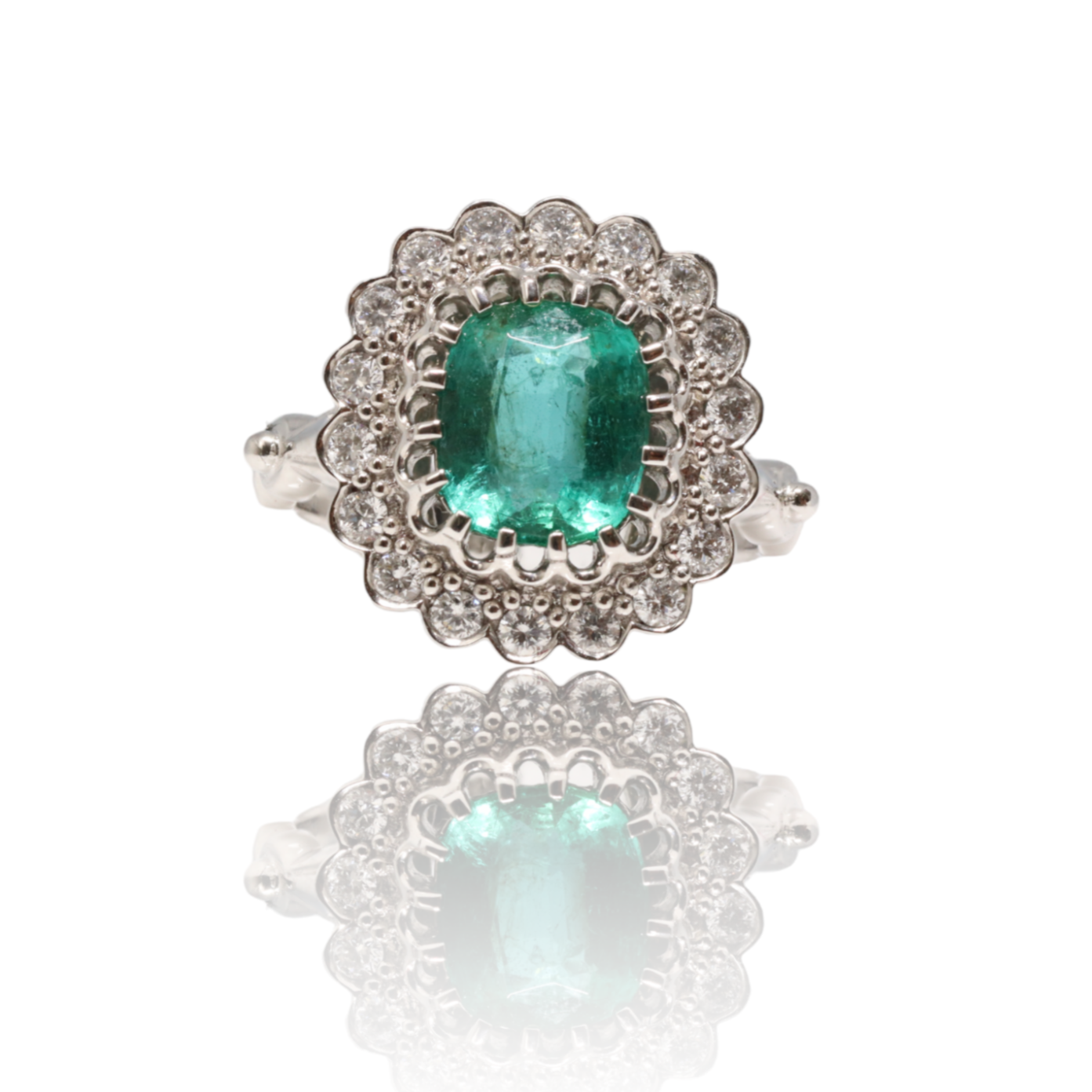 Platinum Art Deco style Emerald and Diamond ring