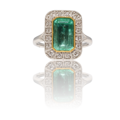 18ct white gold Colombian emerald and diamond dress ring