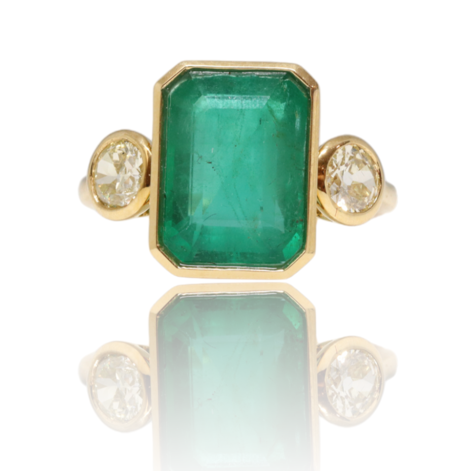18ct yellow gold emerald and diamond trilogy dress ring