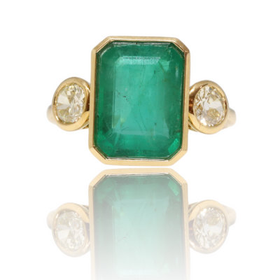 18ct yellow gold emerald and diamond trilogy dress ring