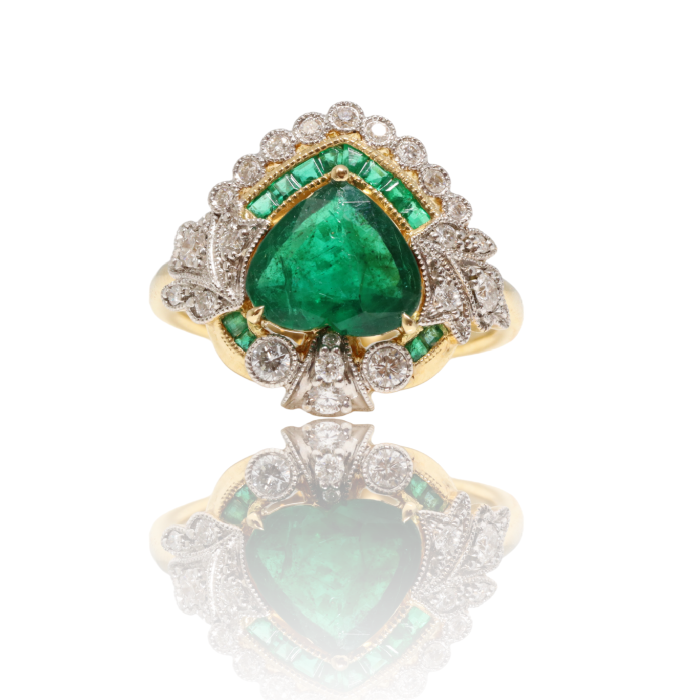 18CT yellow gold heart cut emerald and diamond ring