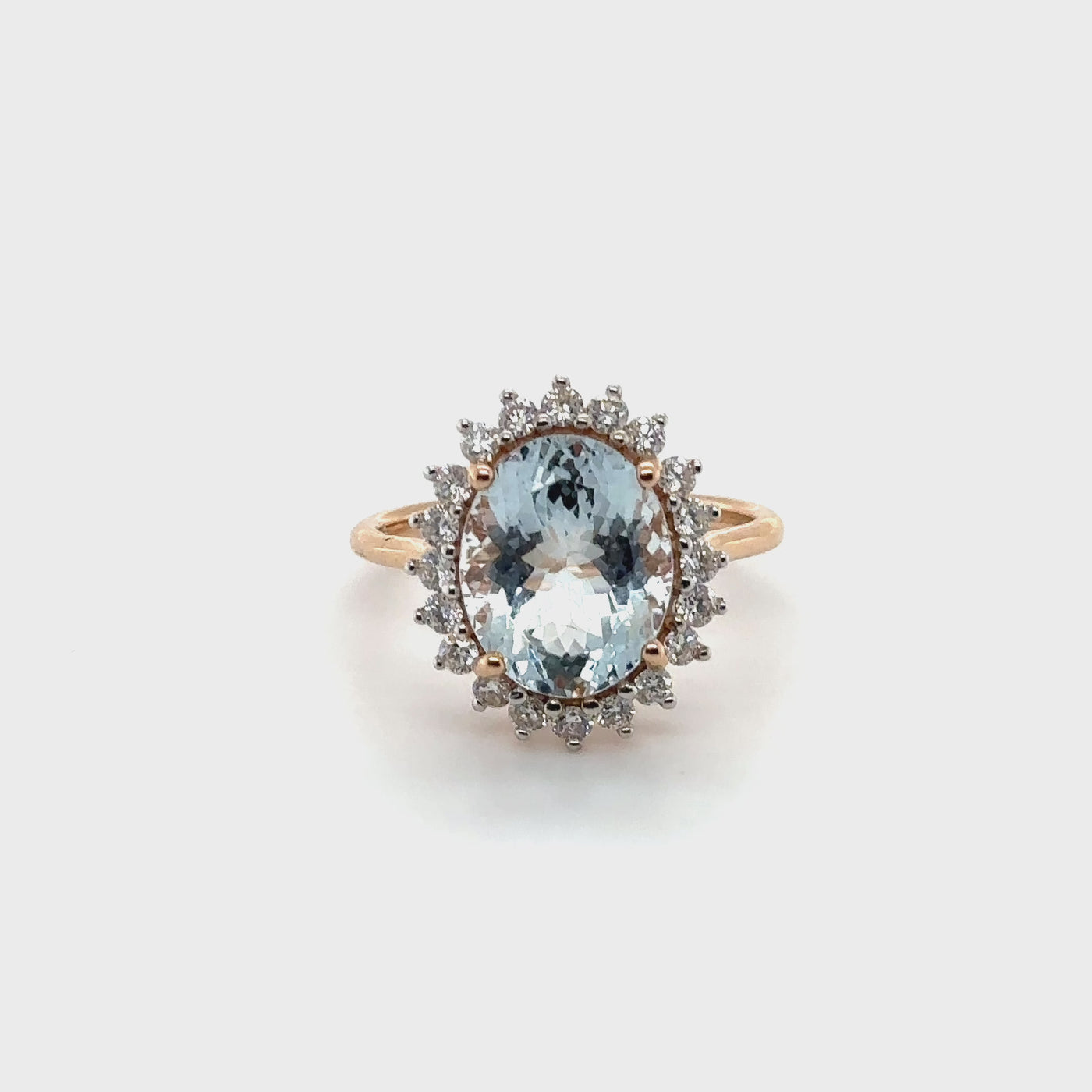 14ct rose gold Aquamarine and diamond cluster ring