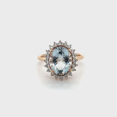 14ct rose gold Aquamarine and diamond cluster ring