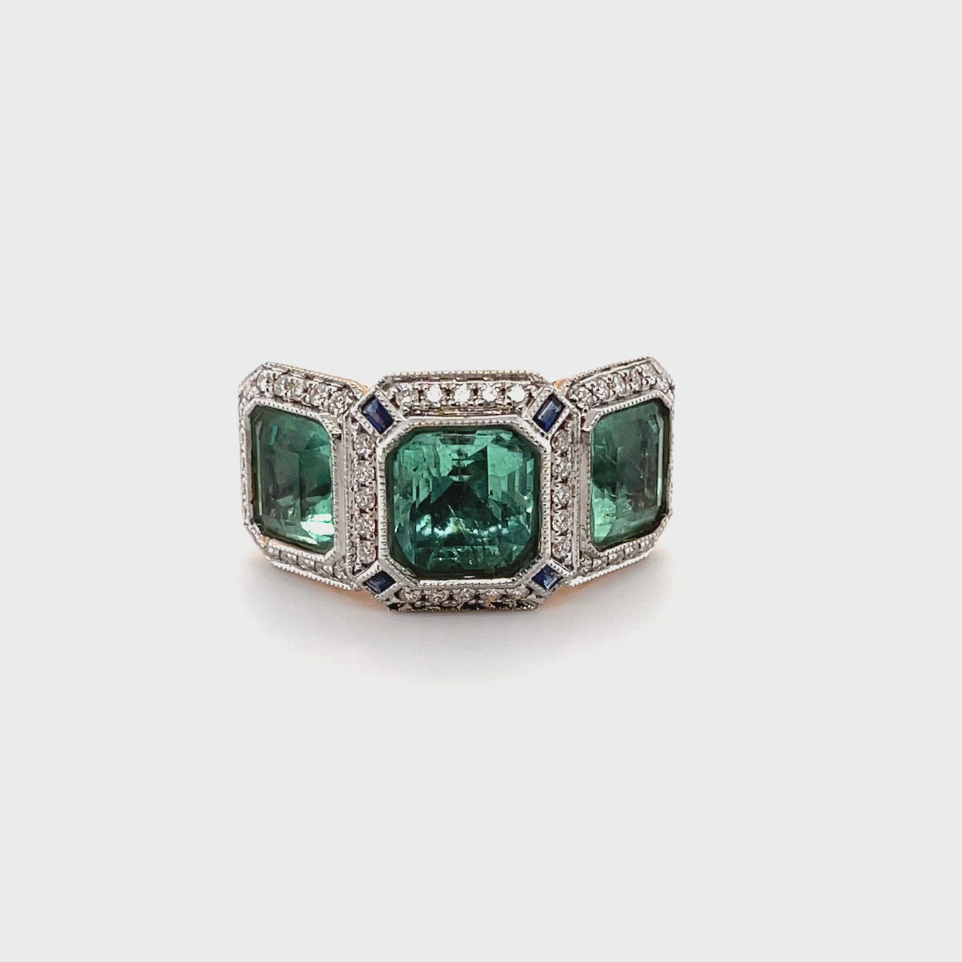 18CT rose gold Trilogy Colombian Emerald, Blue Sapphire and Diamond ring