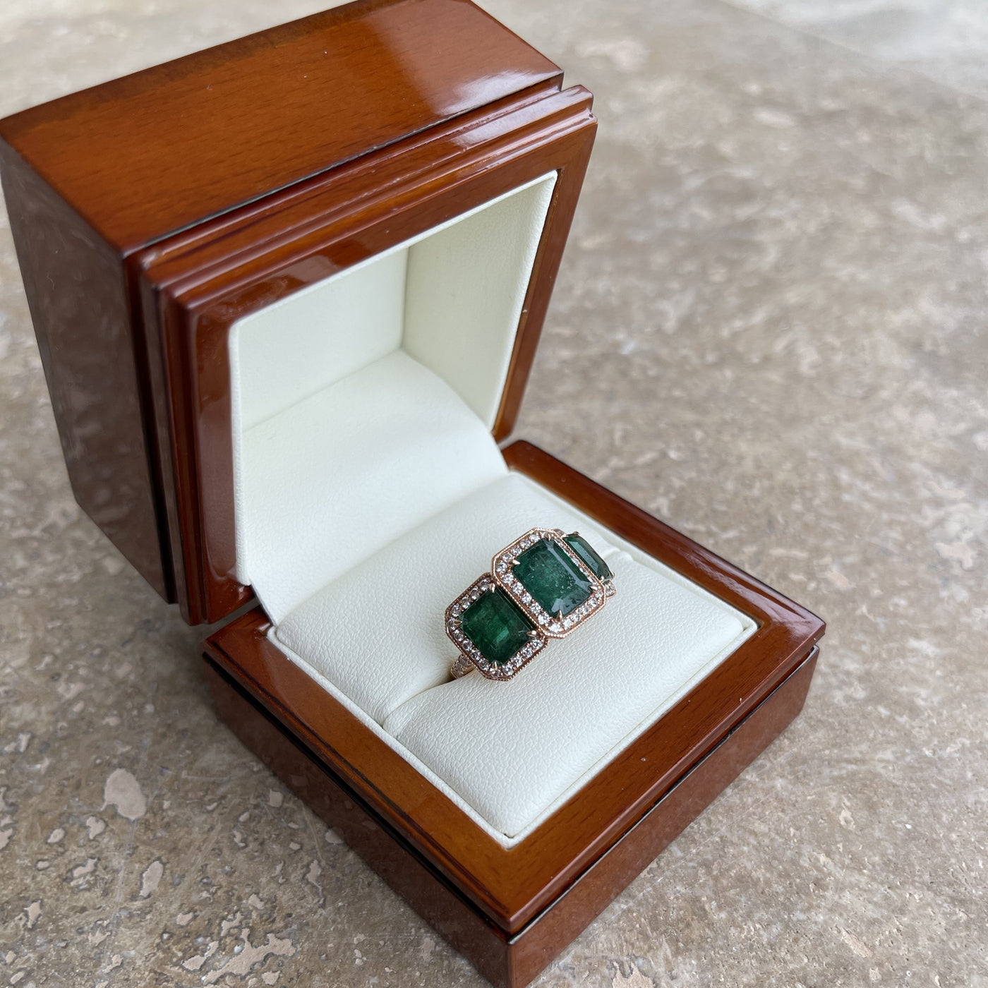 18CT Rose Gold Trilogy Emerald and Diamond Ring