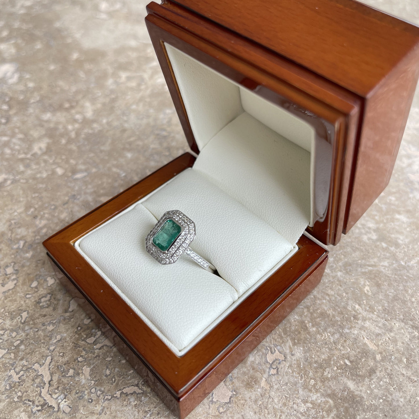 18CT White Gold Emerald and Diamond ring