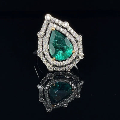 18CT White Gold Pear Emerald and Diamond Ring