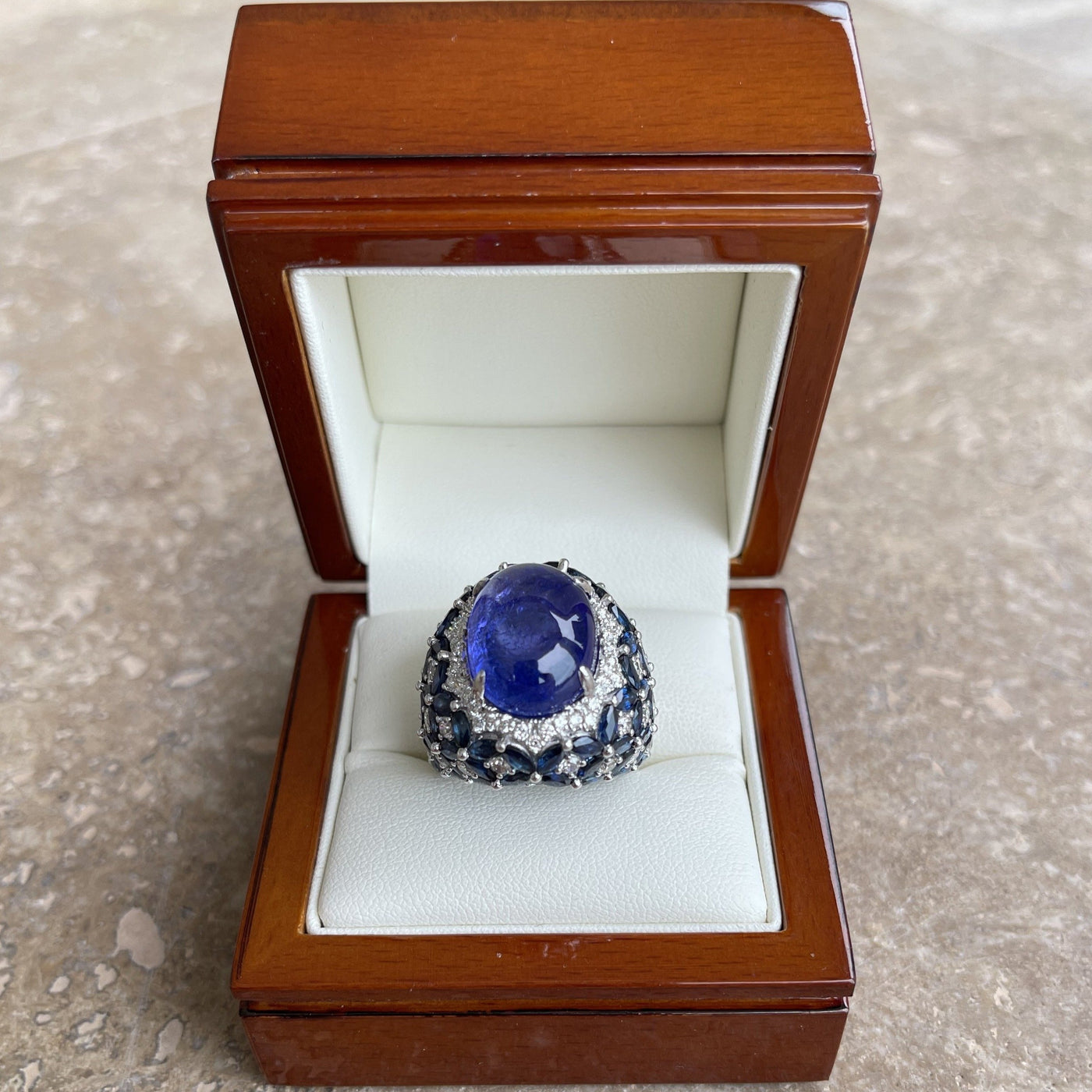 18CT White Gold Tanzanite, Sapphire and Diamond Ring