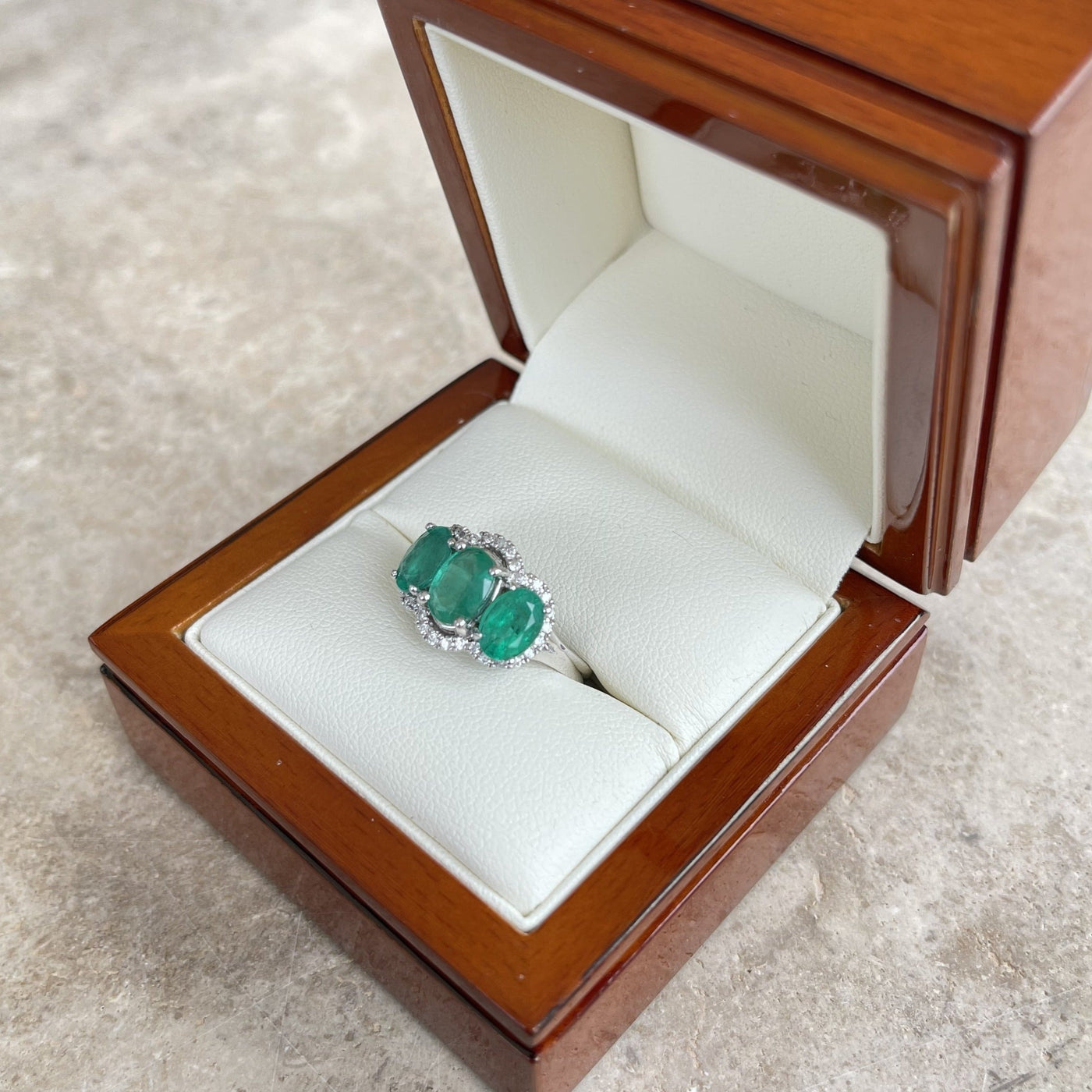 18CT White Gold Trilogy Emerald and Diamond Ring