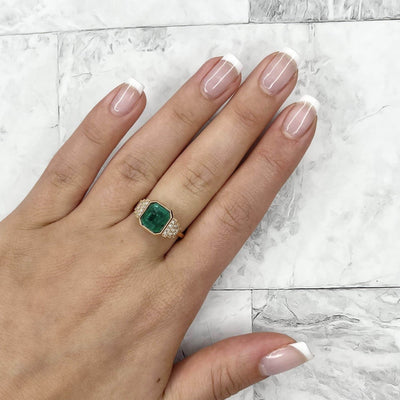 18CT Rose Gold Emerald and Diamond Ring