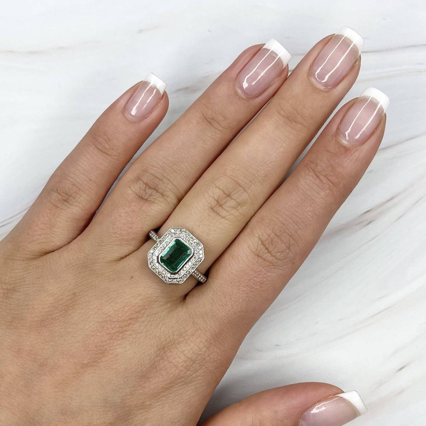 18CT White Gold Emerald and Diamond ring