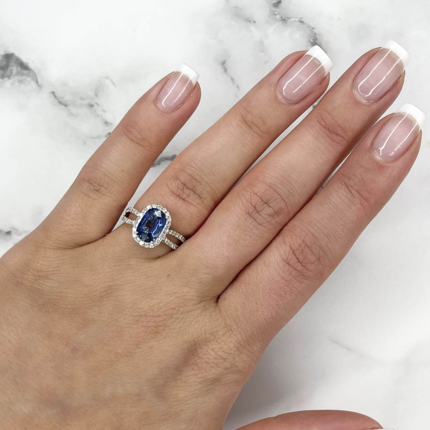 18CT White Gold Sapphire and Diamond Ring