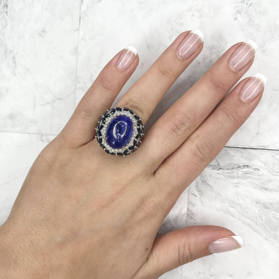 18CT White Gold Tanzanite, Sapphire and Diamond Ring