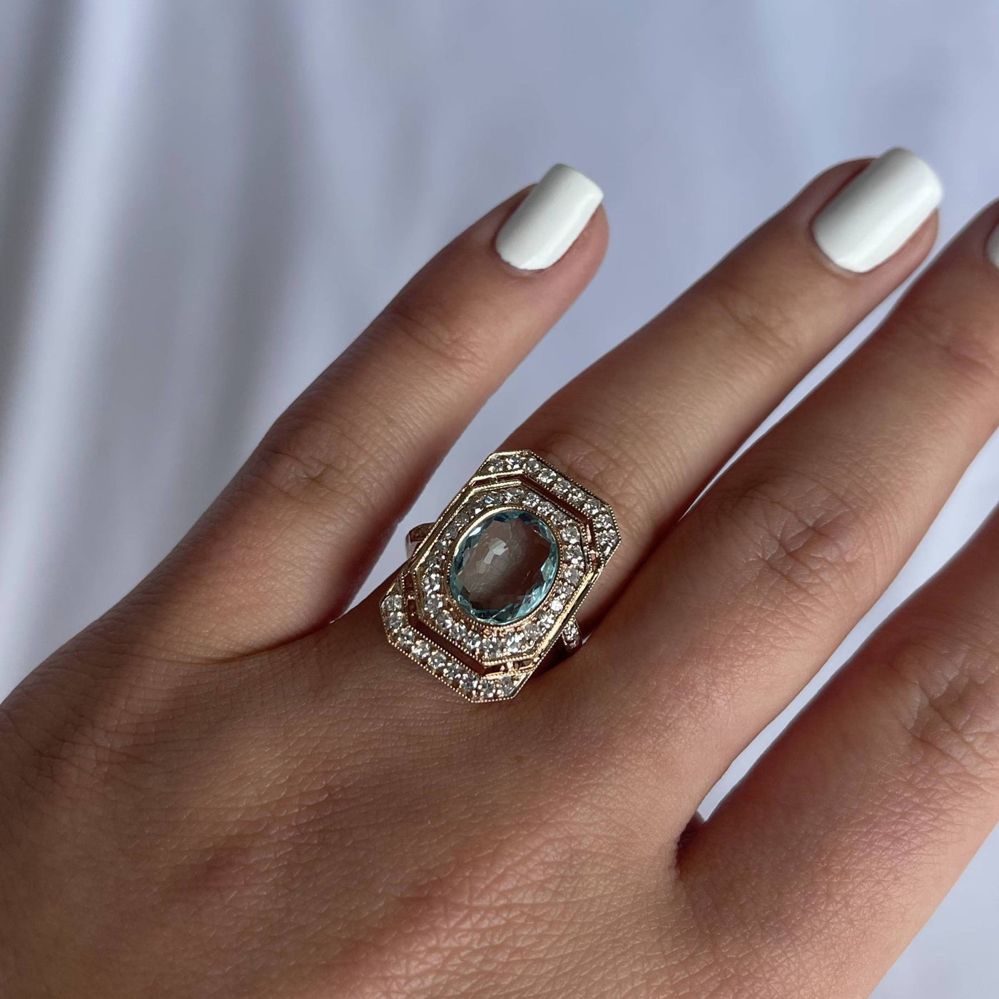 18CT rose gold Aquamarine and diamond ring
