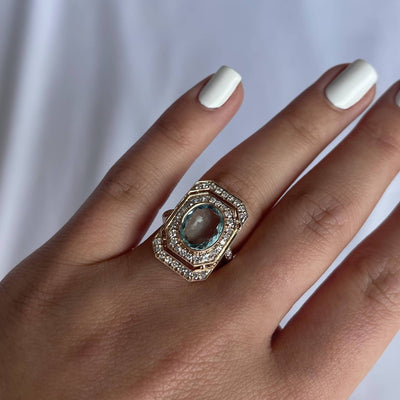 18CT rose gold Aquamarine and diamond ring