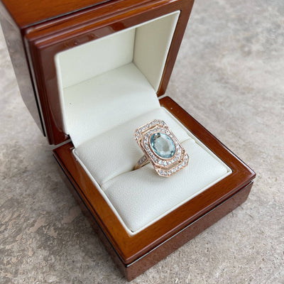 18CT rose gold Aquamarine and diamond ring