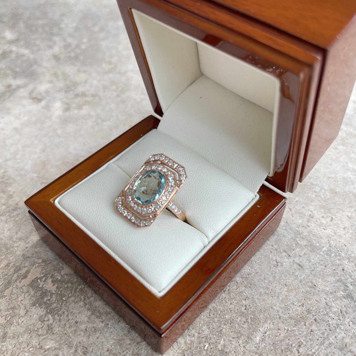 18CT rose gold Aquamarine and diamond ring