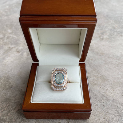18CT rose gold Aquamarine and diamond ring