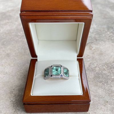 18CT rose gold Trilogy Colombian Emerald, Blue Sapphire and Diamond ring