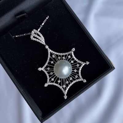 18CT white gold diamond and pearl necklace and pendant