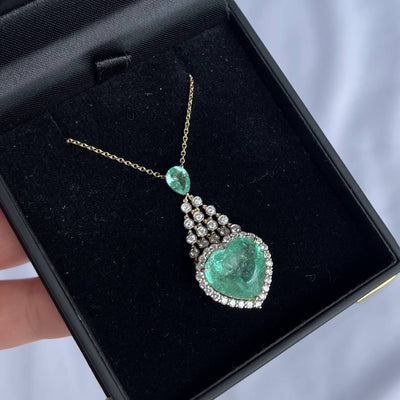 18CT yellow gold colombian emerald and diamond pendant and necklace
