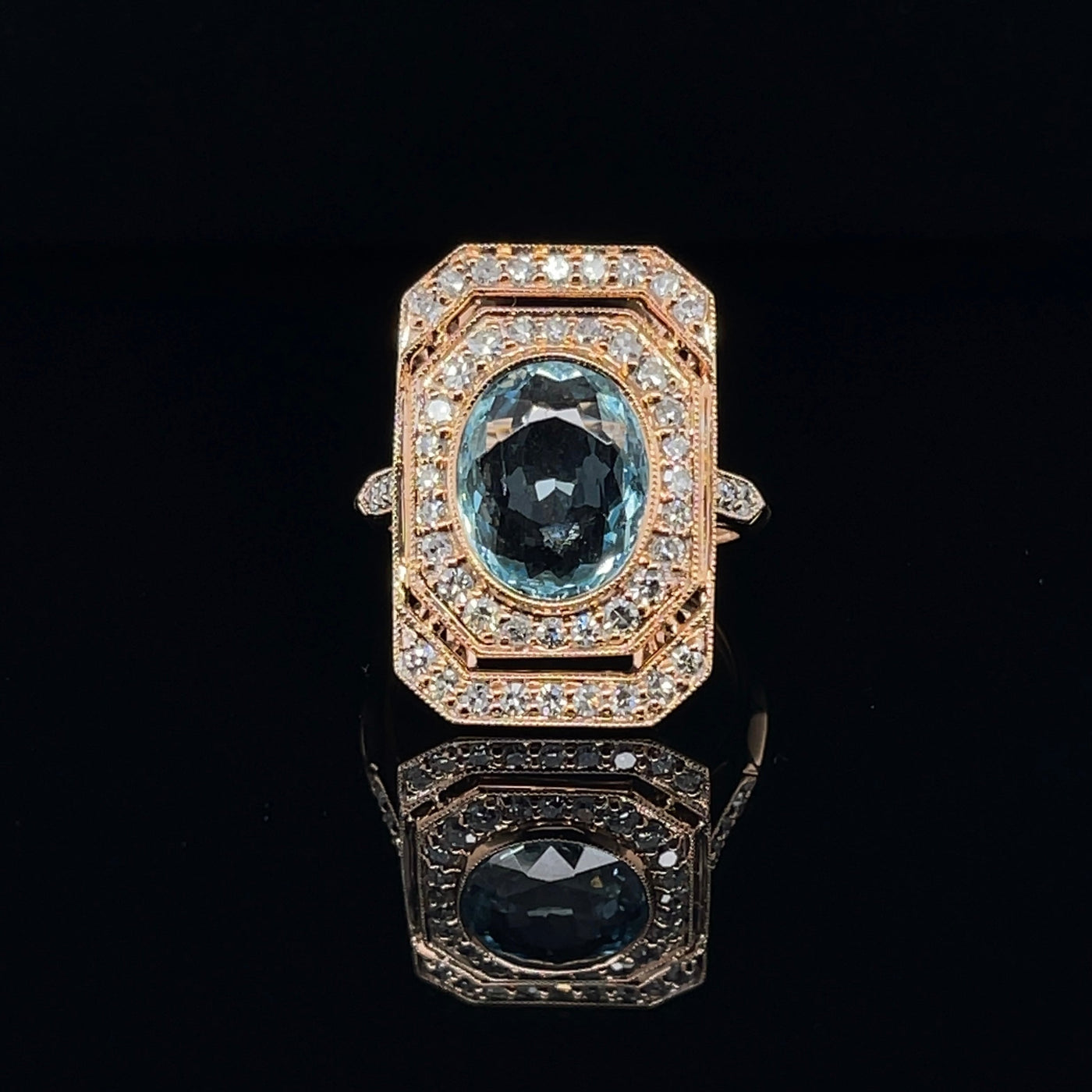 18CT rose gold Aquamarine and diamond ring