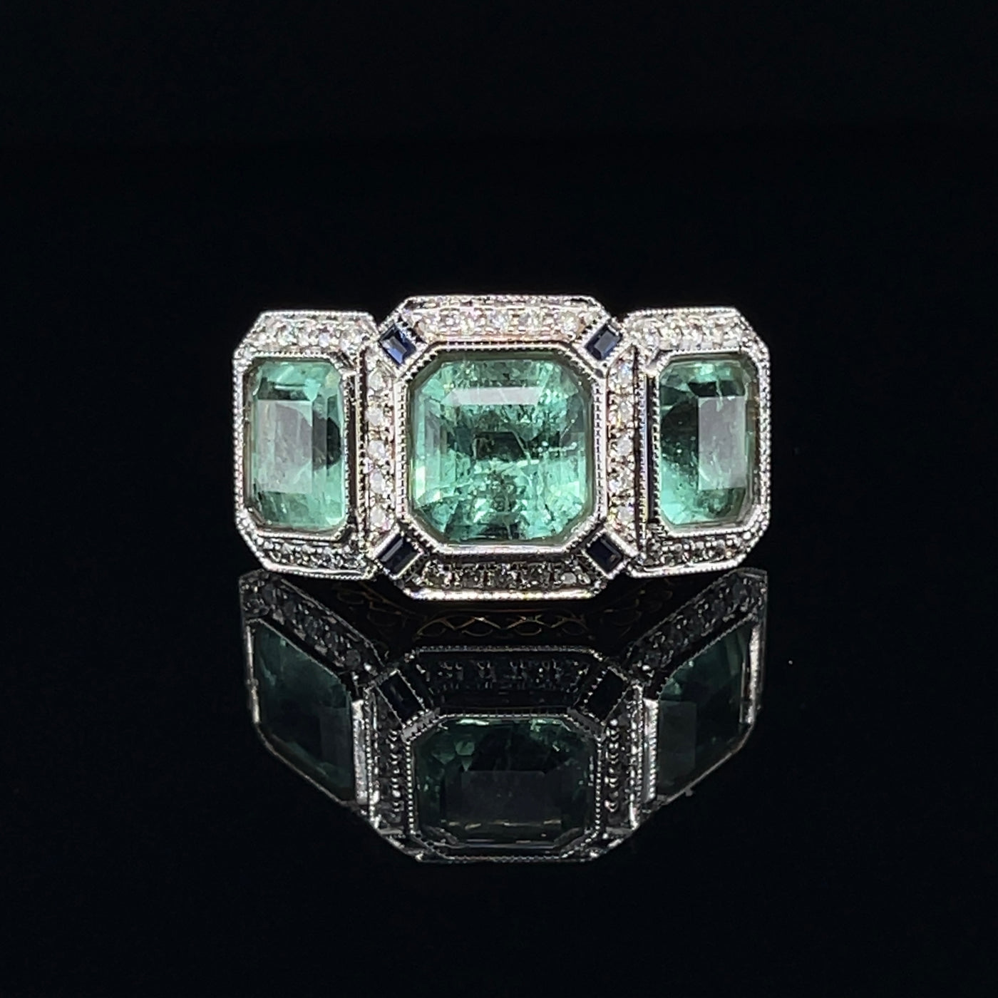 18CT rose gold Trilogy Colombian Emerald, Blue Sapphire and Diamond ring