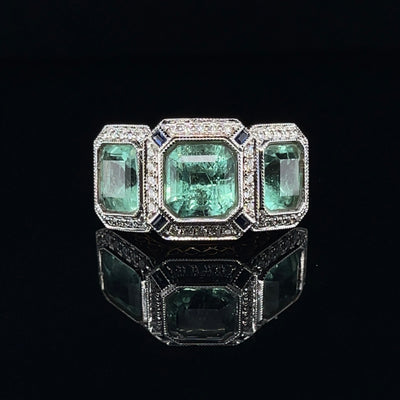 18CT rose gold Trilogy Colombian Emerald, Blue Sapphire and Diamond ring