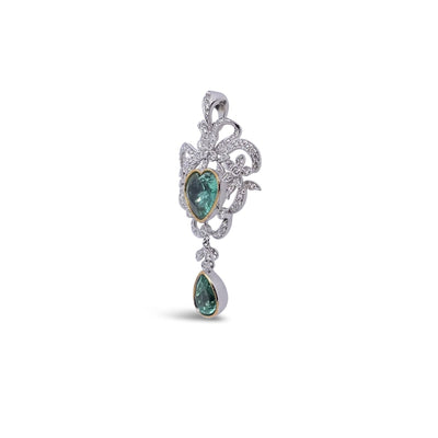 18CT white gold Colombian emerald and diamond pendant
