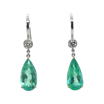 18CT white gold colombian emerald and diamond earring