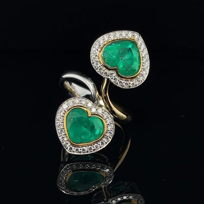 18CT yellow and white gold colombian emerald and diamond ring