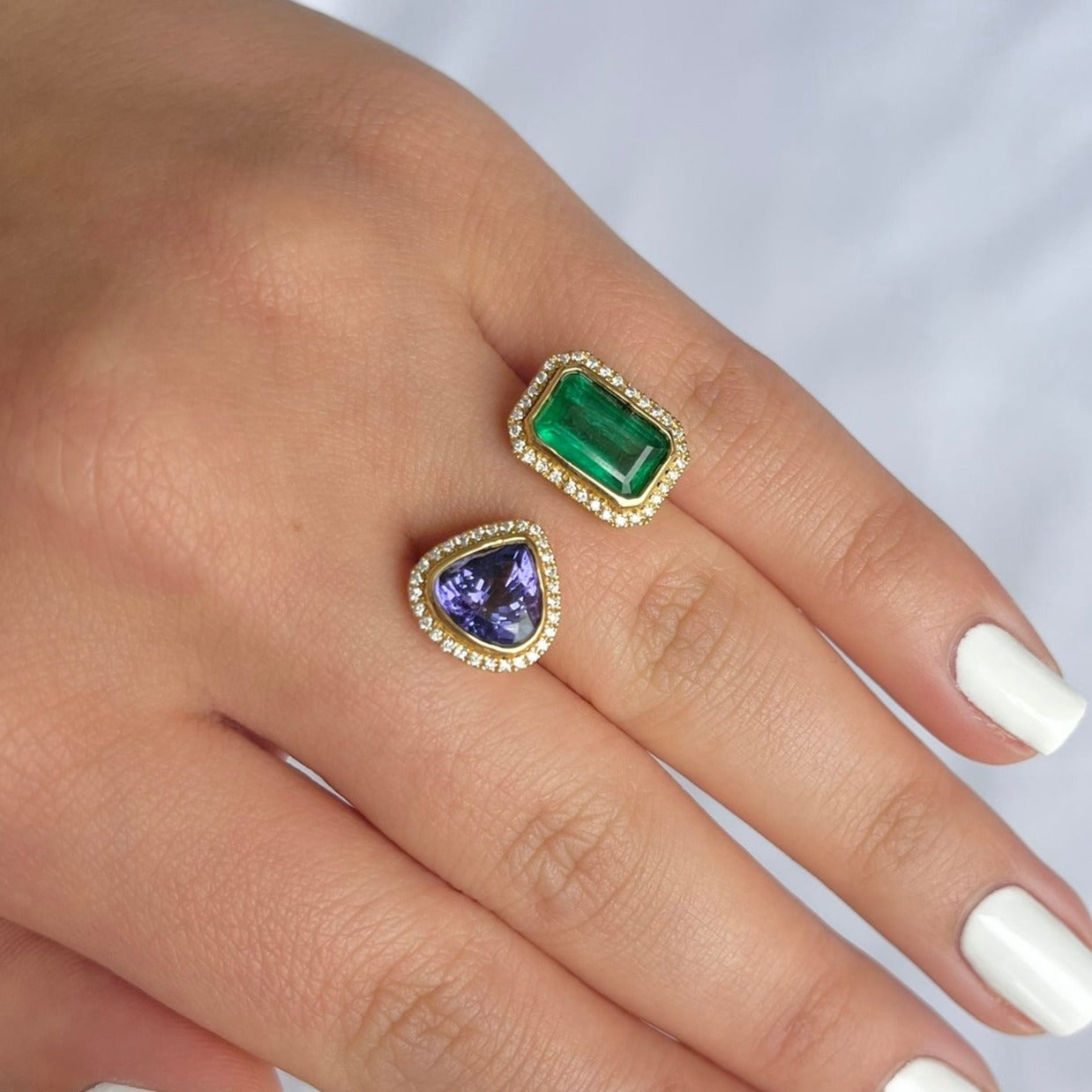 18CT yellow gold Emerald, Tanzanite and diamond open face ring