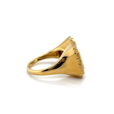 18CT yellow gold Emerald, Tanzanite and diamond open face ring