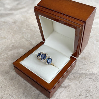 18CT Yellow Gold Trilogy Sapphire and Diamond Ring