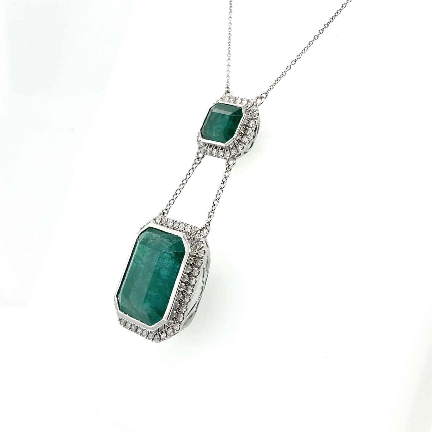 18ct white gold double emerald pendant and diamond necklace