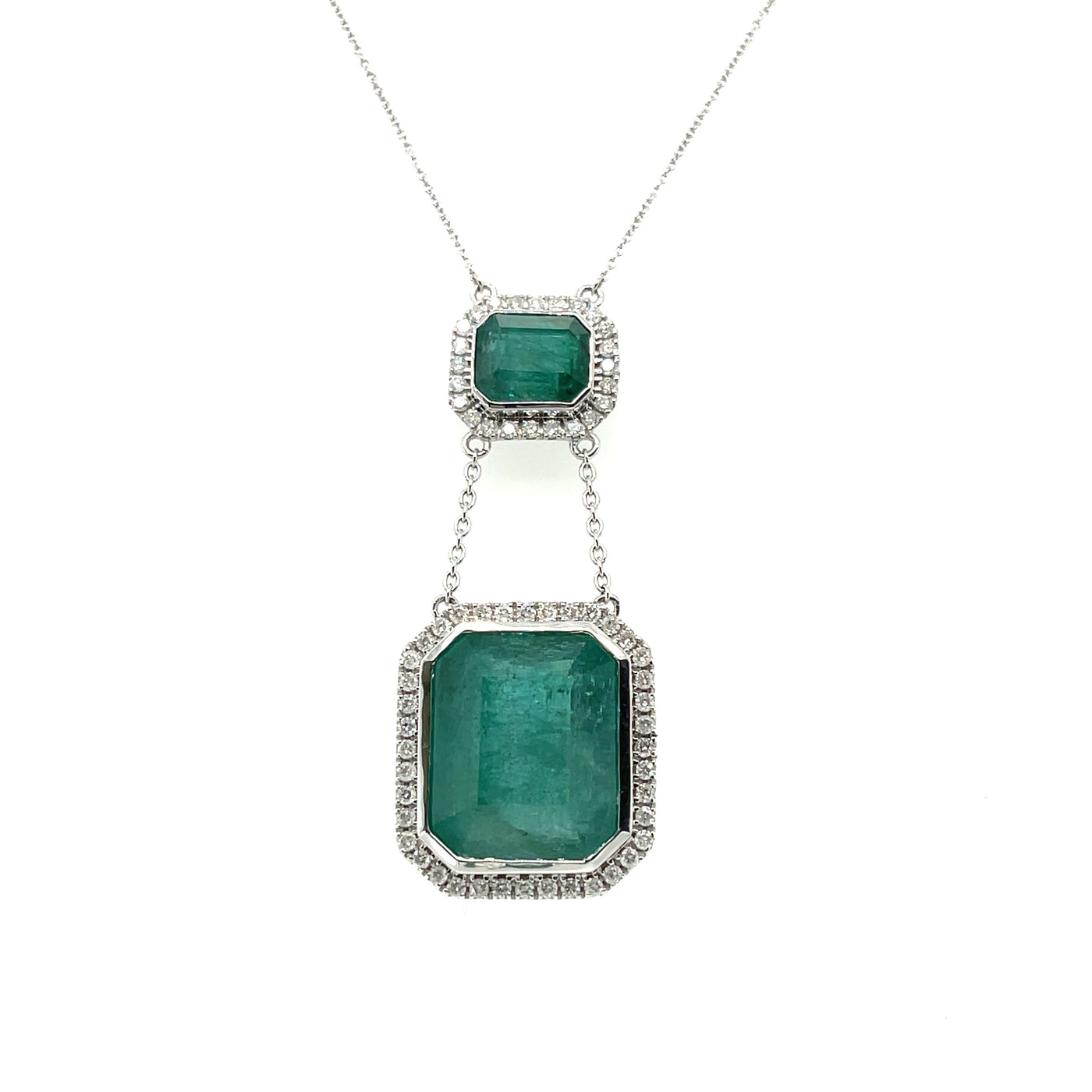 18ct white gold double emerald pendant and diamond necklace