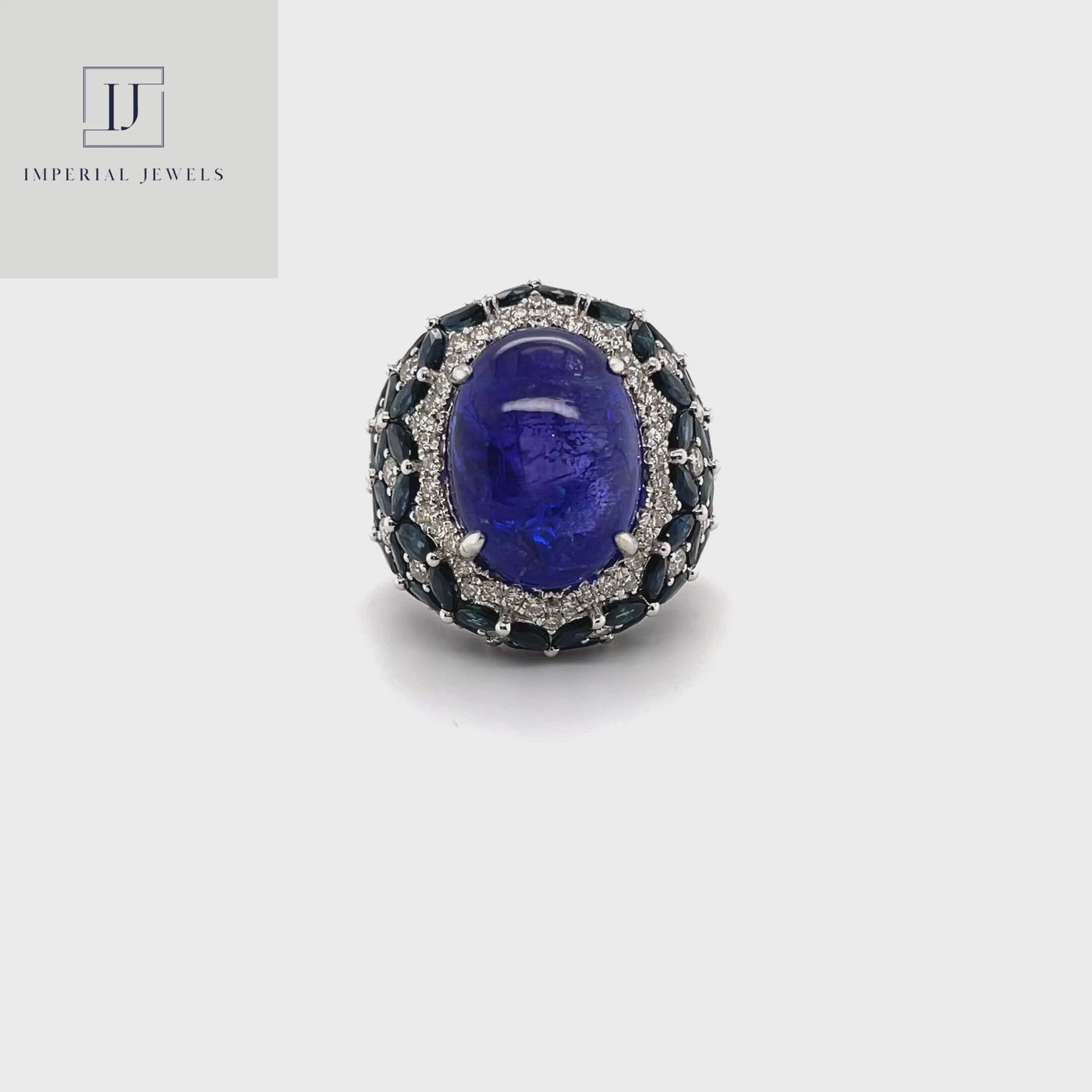 18CT White Gold Tanzanite, Sapphire and Diamond Ring