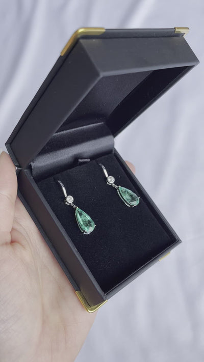 18CT white gold colombian emerald and diamond earring
