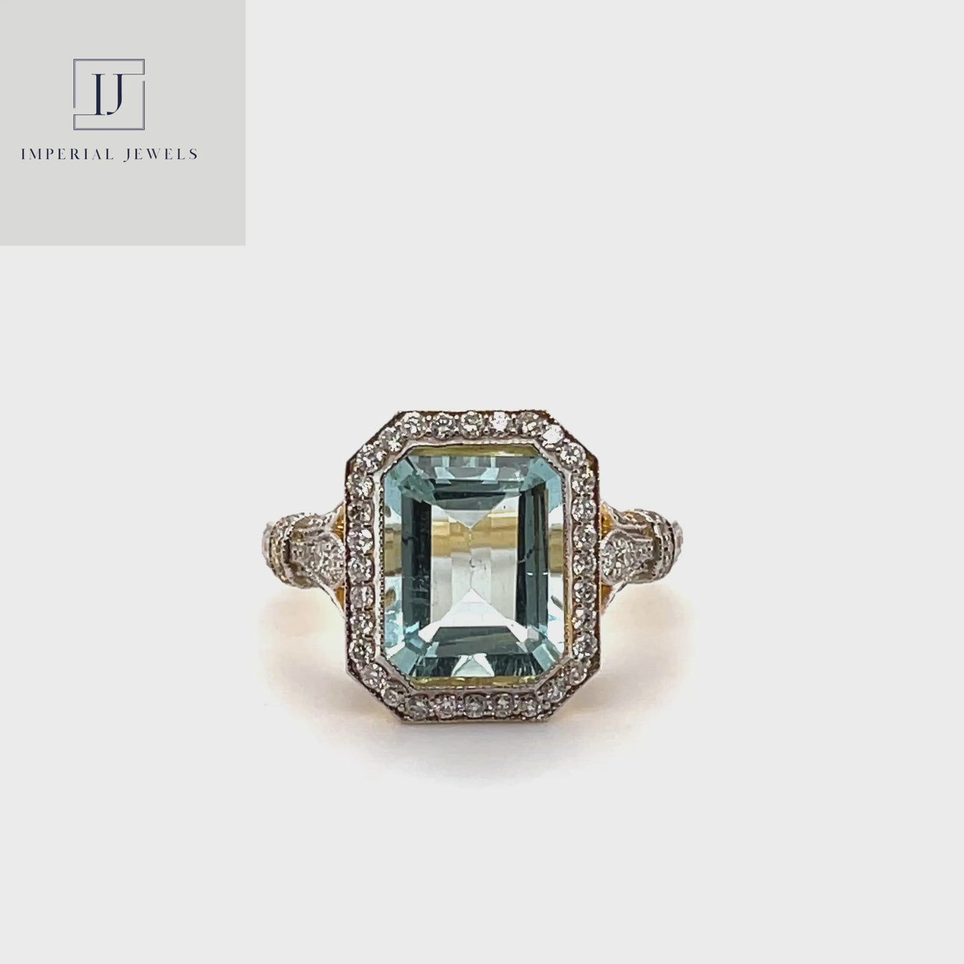 18CT Yellow Gold Aquamarine and Diamond Ring