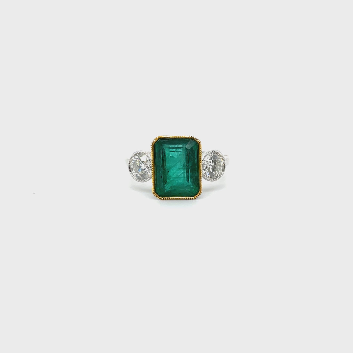 Platinum Emerald and Diamond trilogy ring