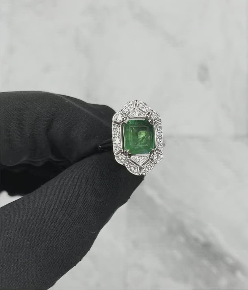 18CT White Gold Emerald and Diamond Ring