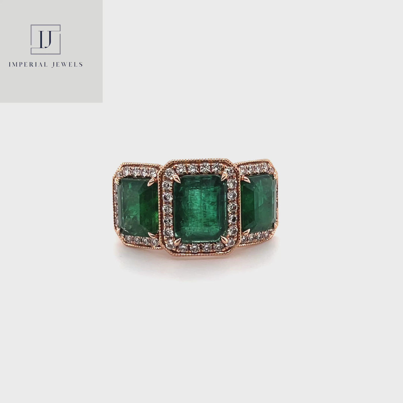 18CT Rose Gold Trilogy Emerald and Diamond Ring
