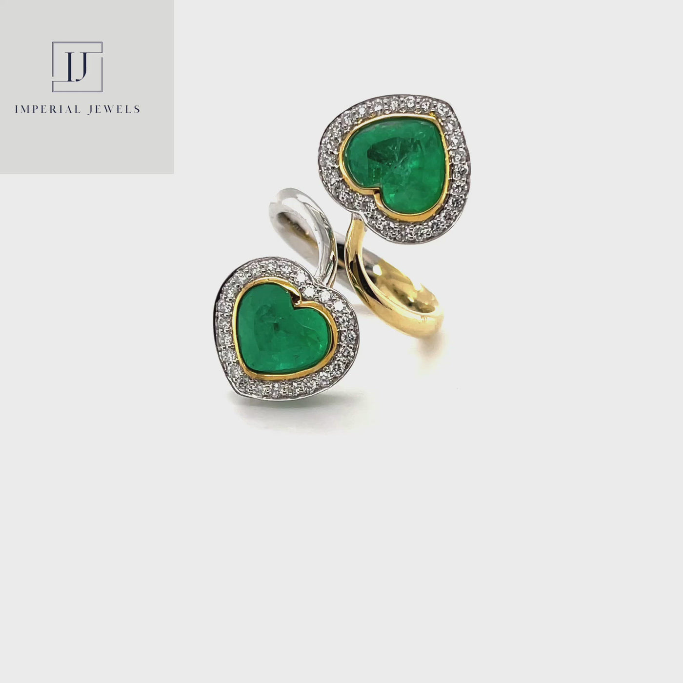 18CT yellow and white gold colombian emerald and diamond ring