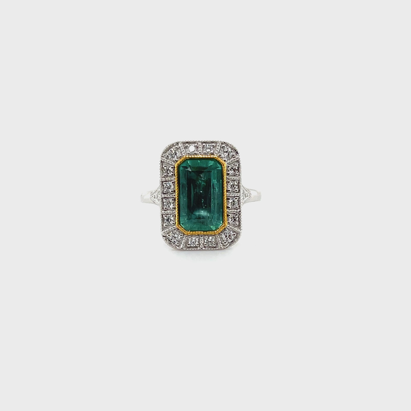 18ct white gold Colombian emerald and diamond dress ring