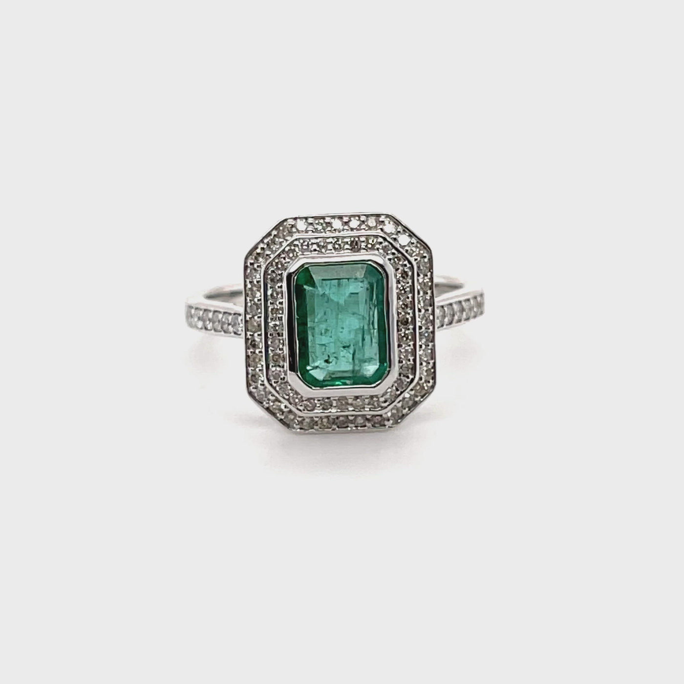 18CT White Gold Emerald and Diamond ring