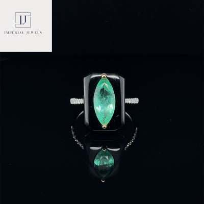 18CT white gold marquise colombian emerald, onyx and diamond ring